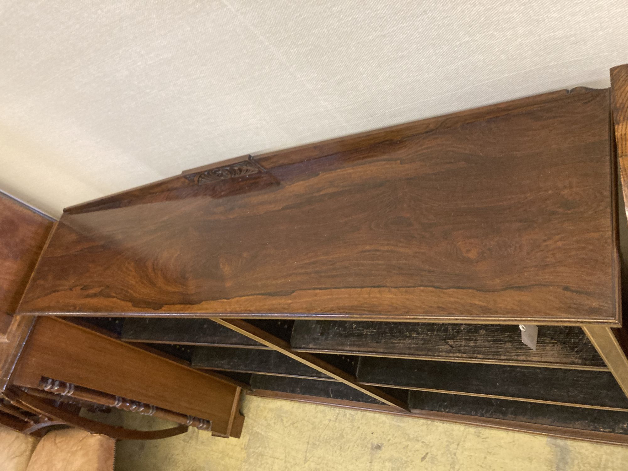 An Edwardian boxwood strung rosewood open bookcase, width 142cm, depth 32cm, height 103cm